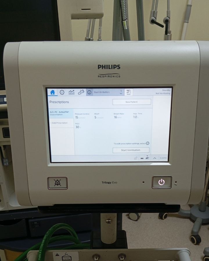 Philips Trilogy Evo ventilator front panel with its screen visible.